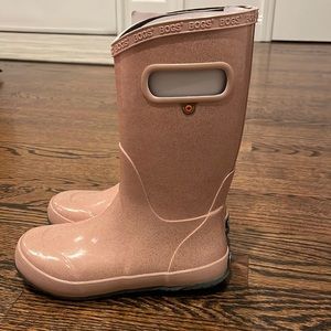 Brand new BOGS rose gold rain boots. Waterproof. Size 2. Comes in original box.